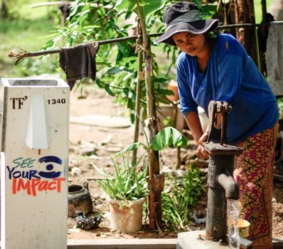 A lady prepares her new biosand water filter