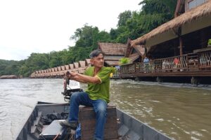 EV boat Electric traditional longtail boat operating in Uthai Thani, Thailand